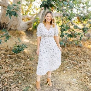 Cream and navy v-neck dress